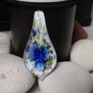 Clear flower pendant.